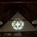 Darfield Does it Again!Inside Saint Patricks Church. The stained glass window features a clover at the centre with a star on the outside.